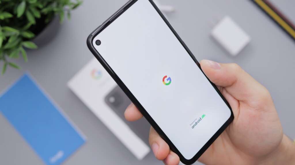 a hand holding a Google Pixel phone